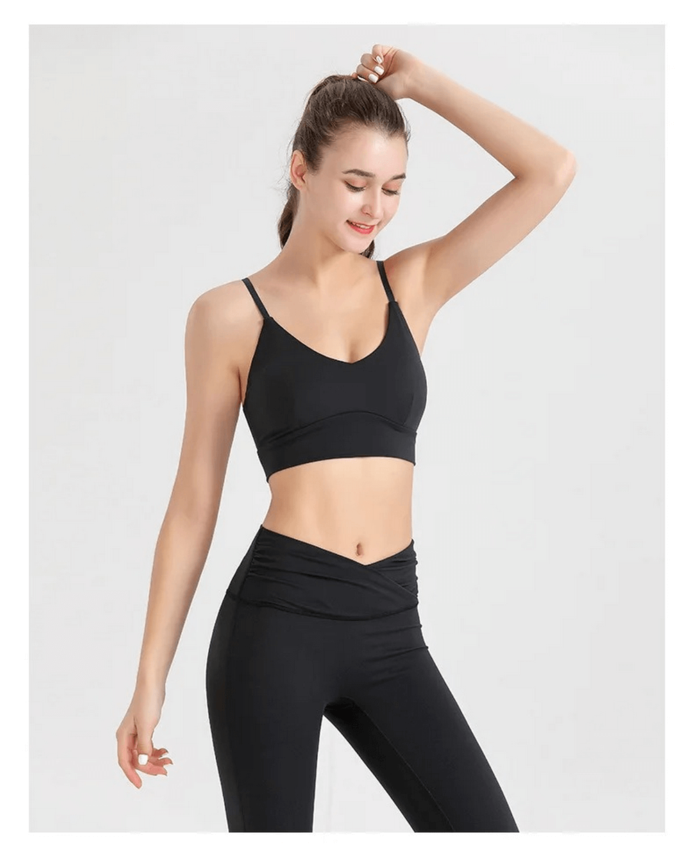 Women's black spandex workout set SF2120 featuring sleeveless top and leggings, perfect for yoga and intense workouts. Breathable and durable.